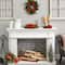 14" Poinsettia, Berry & Golden Pinecone Candelabrum Artificial Arrangement